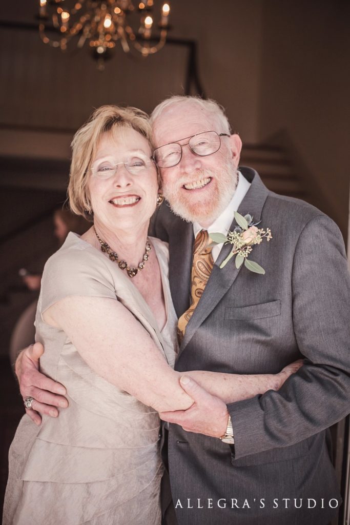 the happy parents of the bride