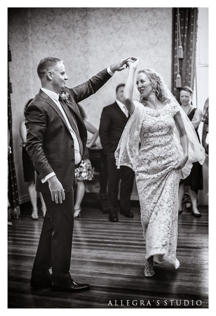 bride and groom's first dance in front parlor